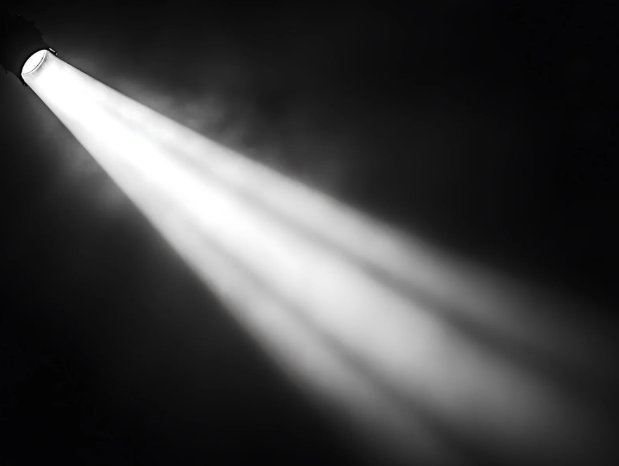 Two bright beams of light cutting through darkness.