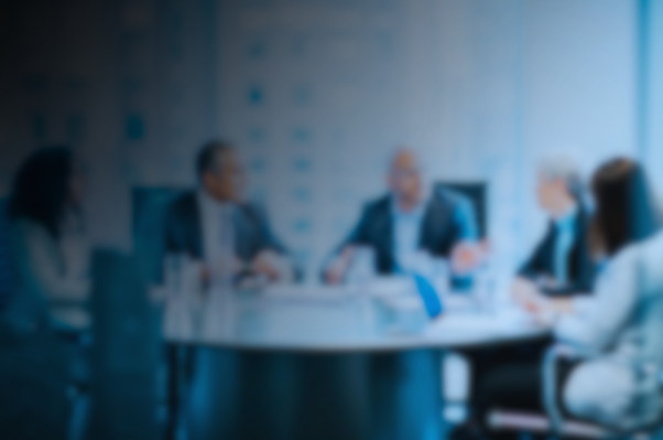 Empty boardroom table set for board skills matrix and governance review
