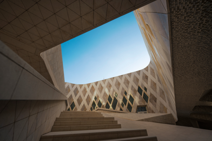 Architectural staircase opening to clear sky representing strategic governance clarity and board orientation for Australian organisations